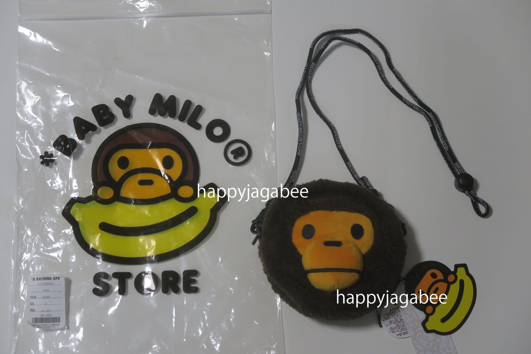 A BATHING APE BABY MILO STORE BABY MILO FACE CROSS BAG