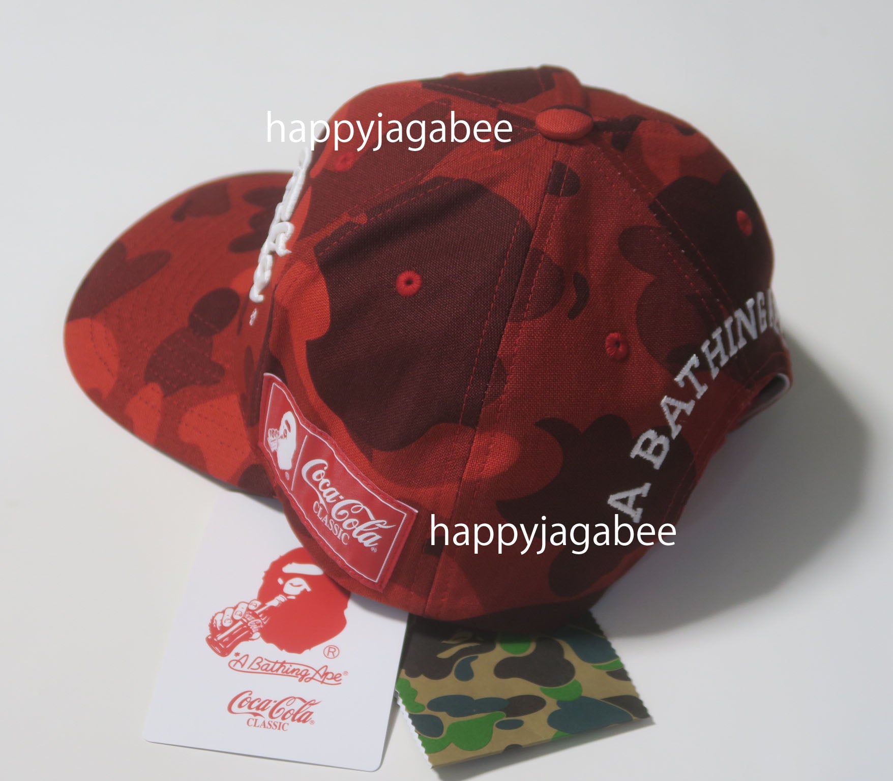 A BATHING APE BAPE x COCA-COLA COLOR CAMO SNAP BACK CAP