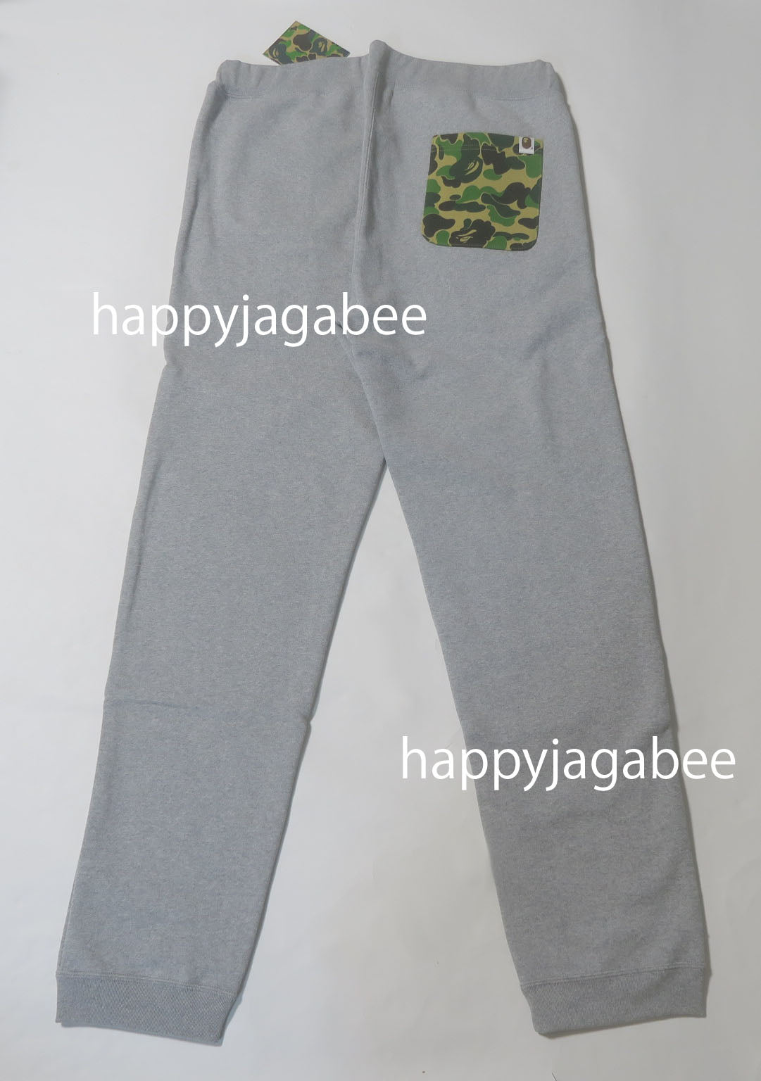 A popular Bathing Ape Gray Camo Shark Sweatpants