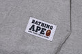 A BATHING APE BASEBALL LOGO RELAXED FIT PULLOVER HOODIE