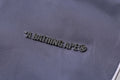 A BATHING APE BATHING APE LOGO NYLON TRACK JACKET Black / Gray