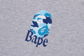 A BATHING APE FLORA APE HEAD RELAXED FIT TEE