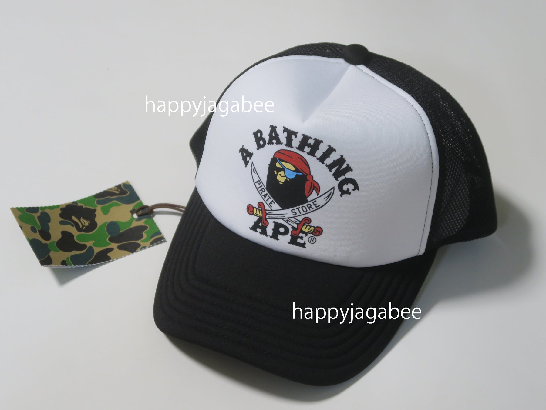 A BATHING APE CROSSBONE COLLEGE MESH CAP