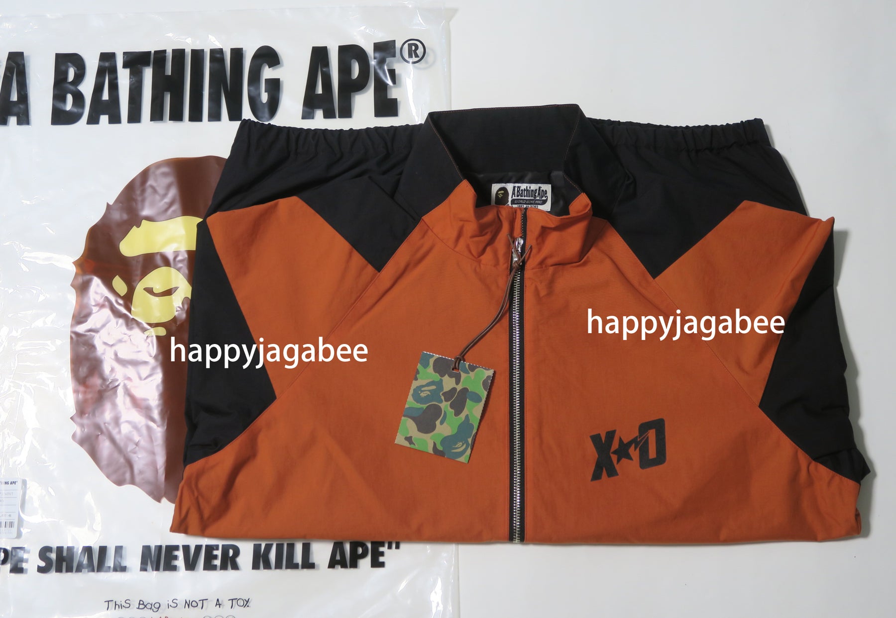 Bape XO orange camo track pants - その他